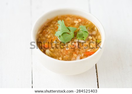 Spicy seafood dipping sauce for seafood on wood background