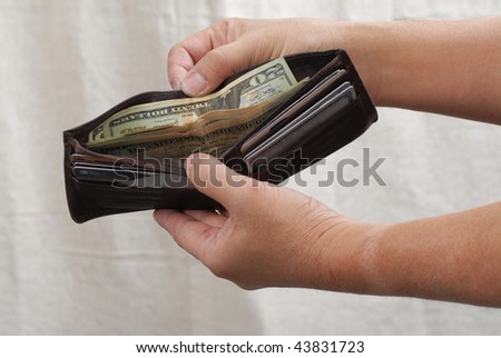 men showing wallet