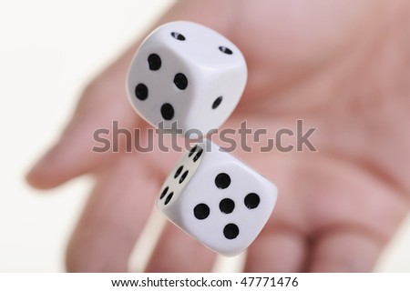 hand throwing two dices