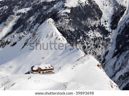 Austria. Alps. Shmittenhorn ski resort. Lonely hotel on the brink of the mountain