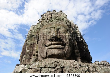 Cambodia. Siem Reap. Angkor Tom. Stone face of Bayon temple, smiling with contented expression