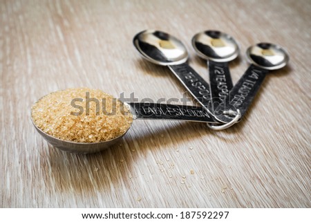 Brown sugar on measuring spoons