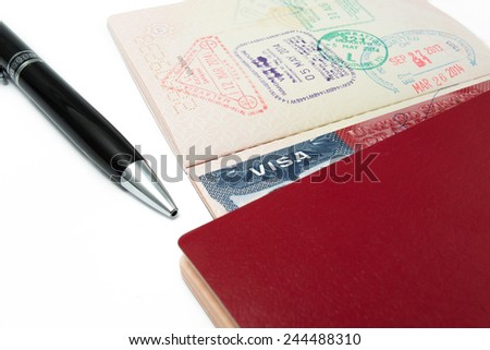 US Visa with passport over isolated background