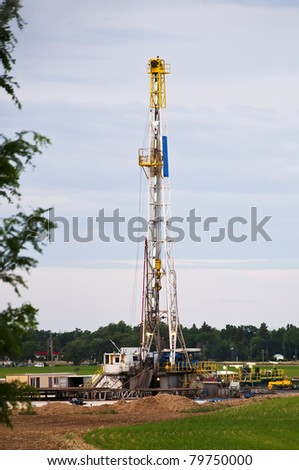 Drilling rig set up in a cornfield in rural Colorado, USA