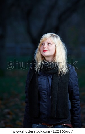 Portrait of young woman at forest