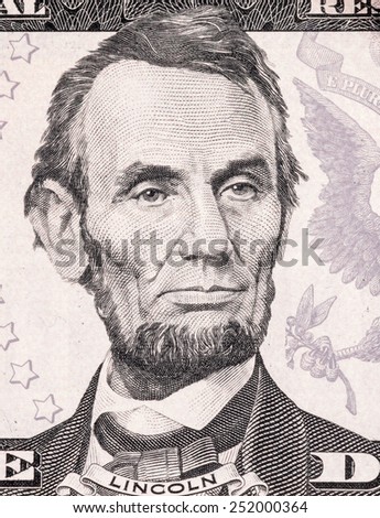 American money, Five dollar bill close-up.