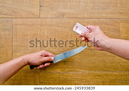 money rob(hand holding knife and another hand giving money for)