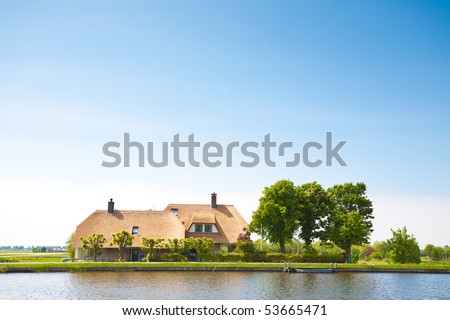 country house on amstel river, the netherlands