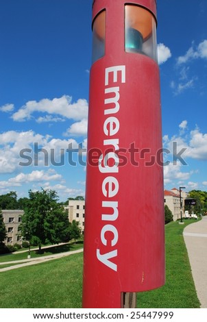 An emergency phone by a college dormitory
