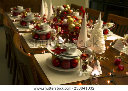 christmas eve table setting with ornaments, new year table setting