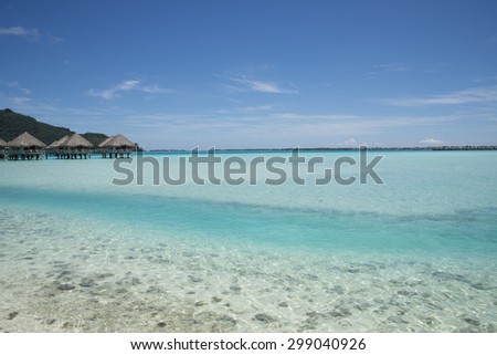 Paradise panoramic view of turquoise lagoon on the tropical island of Bora Bora, near Tahiti, in French Polynesia