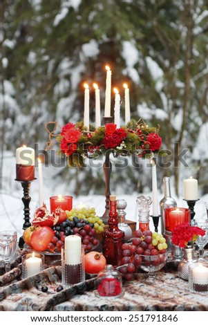 Dinner for Lovers by candlelight in the forest