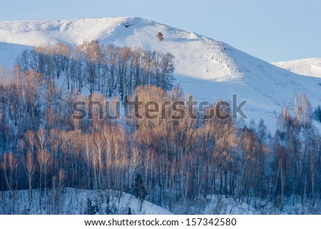 The slope of the hilly banks of the river Kama in the winter. Russia, Tatarstan, the region of the Lower Kama