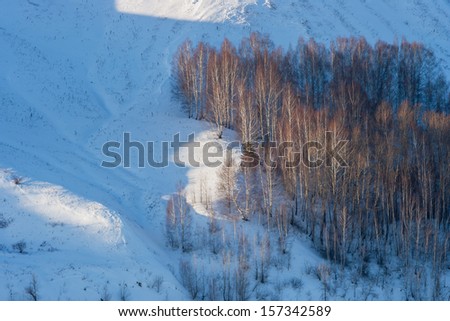 The slope of the hilly banks of the river Kama in the winter. Russia, Tatarstan, the region of the Lower Kama. Fragment