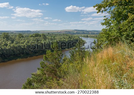 Summer landscape with a river from a high bank. Russia, Tatarstan, the Kama River, near the city of Nizhnekamsk