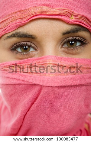 young woman with a veil, close up portrait, studio picture