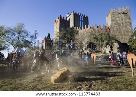 GUIMARAES, PORTUGAL - SEPTEMBER 16: Medieval themed fairs; arts, crafts, and activities centered around the Medieval period at FEIRA AFONSINA, on September 16, 2012 in Guimaraes, Portugal