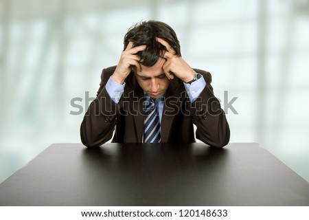 worried business man on a desk at the office