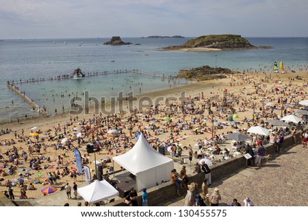 ST MALO, FRANCE - AUGUST 11: Crowded beach of St Malo in the summer, on August 11, 2012 in St Malo, Brittany, France.