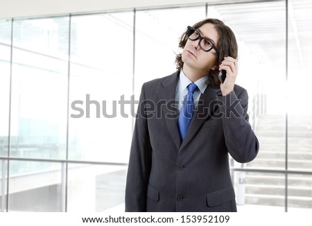 worried business man on the phone at the office