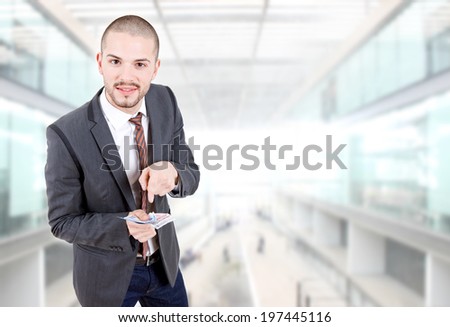 young business man with money at the office