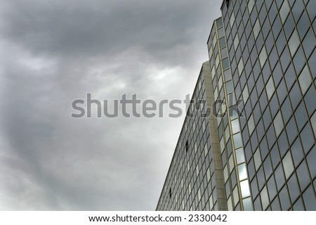 modern mirror building detail and the sky