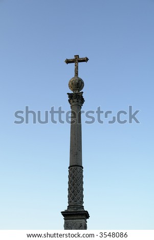 catholic cross isolated with the sky as background