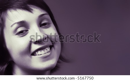 Beautiful happy young woman face. blue tone mode