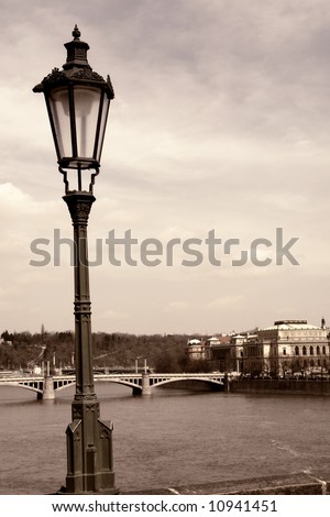 old picture of river vlatva in prague town, digital work