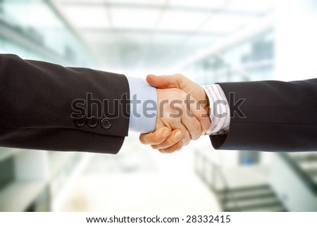Business team hand shake at the office