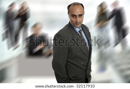 mature adult executive man standing alone looking