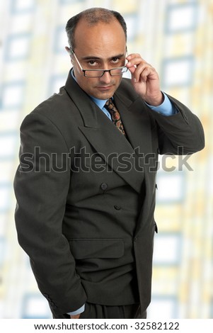 mature business man thinking taking off his glasses