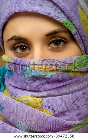 young woman with a veil close up portrait studio picture