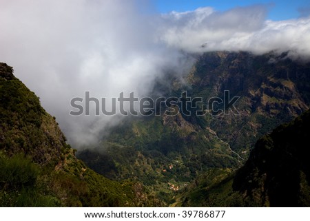 Mountains of Madeira island above the clouds at Encomeada