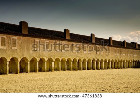 monastery in cape Espichel, in portugal, at sunset light, view of the peligrims rooms