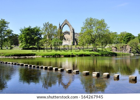 Bolton Priory and stepping stones, Bolton Abbey, Yorkshire Dales