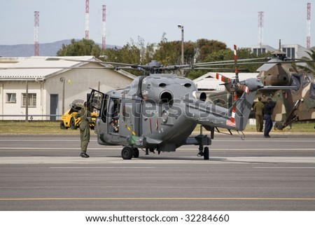 CAPE TOWN, SA - SEPTEMBER 22: A South African Navy Lynx helicopter takes part in an air show at Ysterplaat Air Force Base, Cape Town, South Africa.  September 22, 2008
