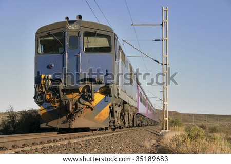 A train in the Karroo on the main railway line between Cape Town and Johannesburg in South Africa