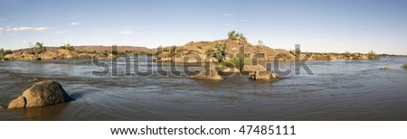 An island in the Orange River near Kakamas next to the Augrabies Waterfall, Northern Cape Province, South Africa, in flood after heavy rains in the catchment areas of the Orange River