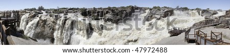Panorama of the Augrabies Waterfall in the Orange River near Kakamas, Northern Cape Province, South Africa in flood after heavy rains in the catchment areas of the Orange River
