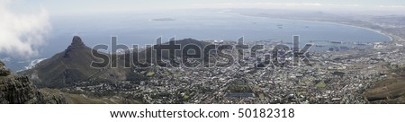 A panoramic view of Lions Head, Signal Hill and the city bowl of Cape Town, South Africa, as seen from the top of Table Mountain.