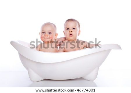 stock photo Girls in white bath tub