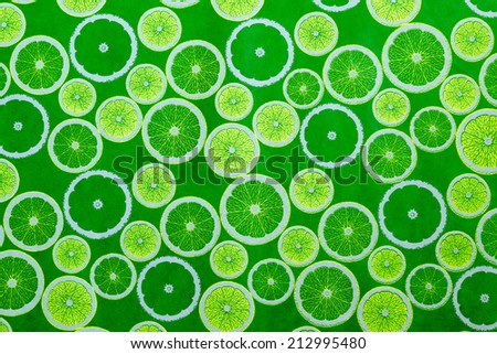 Description:  Lime  green citrus slice design for wallpaper. Title:  Fresh Lime background.
