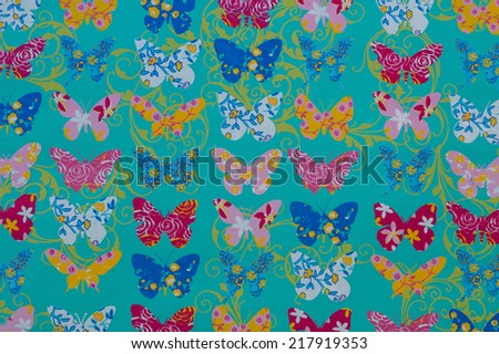 Description:  A joyous turquoise background with colorful butterflies. Title:  Turquoise Butterflies.