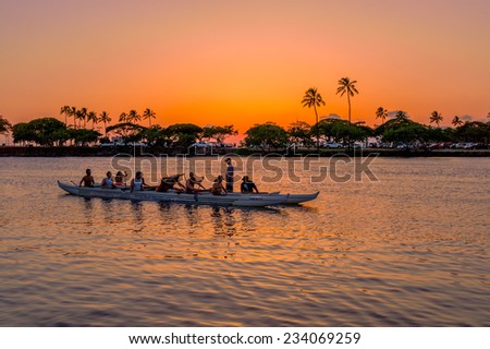 Honolulu, July 20, 2014:  Outrigger Canoe Paddlers listen to their coach as they prepare for the Hawaii State Canoe Championships, Honolulu, Hawaii, USA.  July 20, 2014