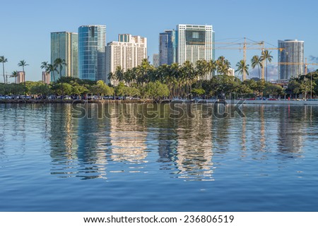 Honolulu, Dec. 1:  Honolulu Cityscape reflecting off of The Ala Wai Harbor.  Honolulu, Hawaii, USA.  Dec. 1, 2014.