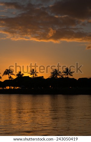 Description:  Late evening silhouette of Honolulu from the water. Title:  