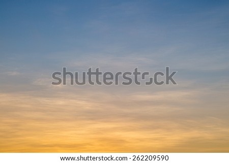 Evening sky above Waikiki, Hawaii, with a golden sky against an azure blue background.