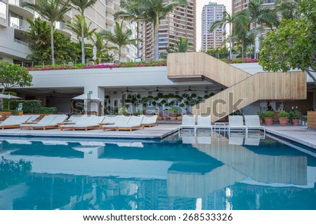 Honolulu, Hawaii, USA, April 11, 2015:  Morning light reflects off the lower deck pool at The Modern Hotel.  The Modern is Honolulu\'s most exclusive getaway spot for the rich and famous.