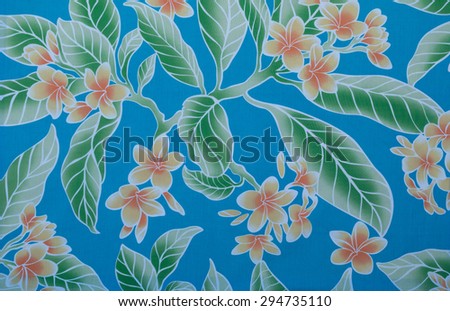 1960\'s faded blue, green, white, and orange aloha shirt cloth fragment.